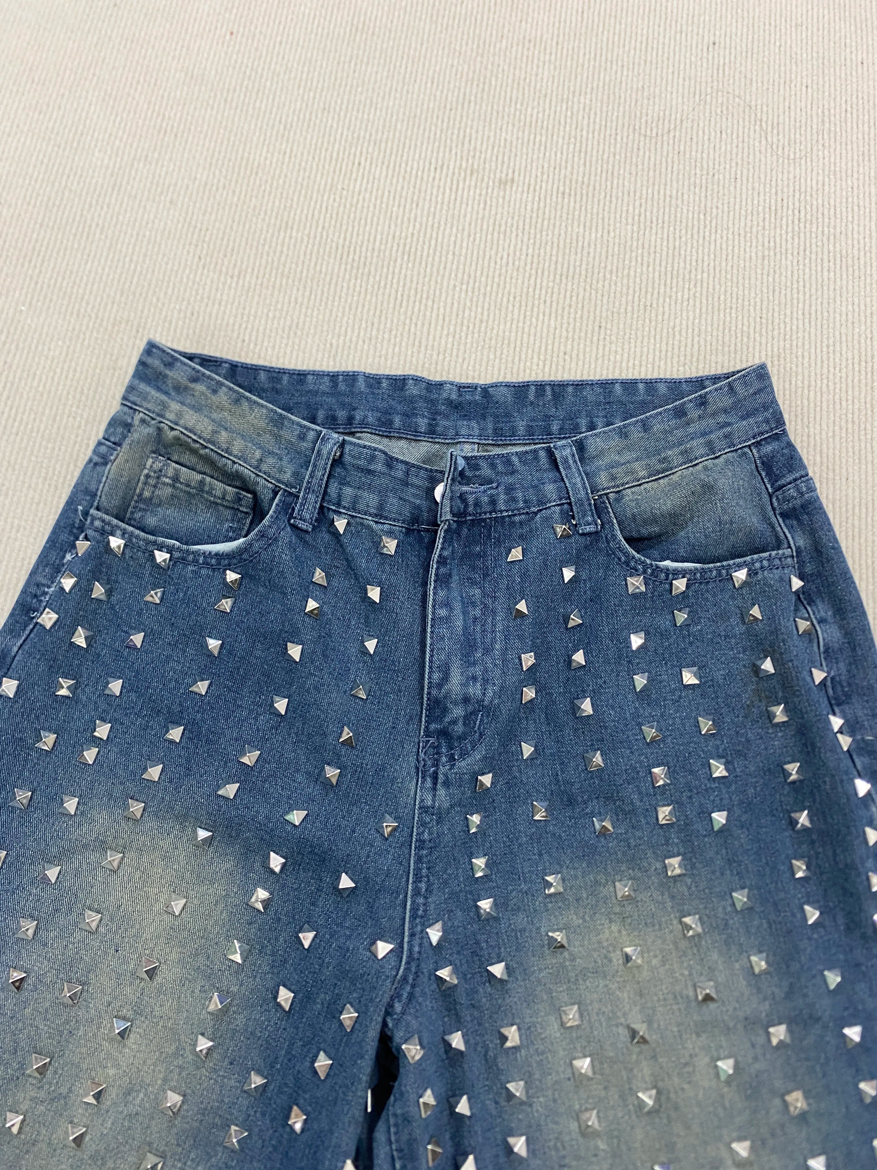 New denim pants for both men and women, specially designed for simple daily wear with holes and knees, rivet jeans