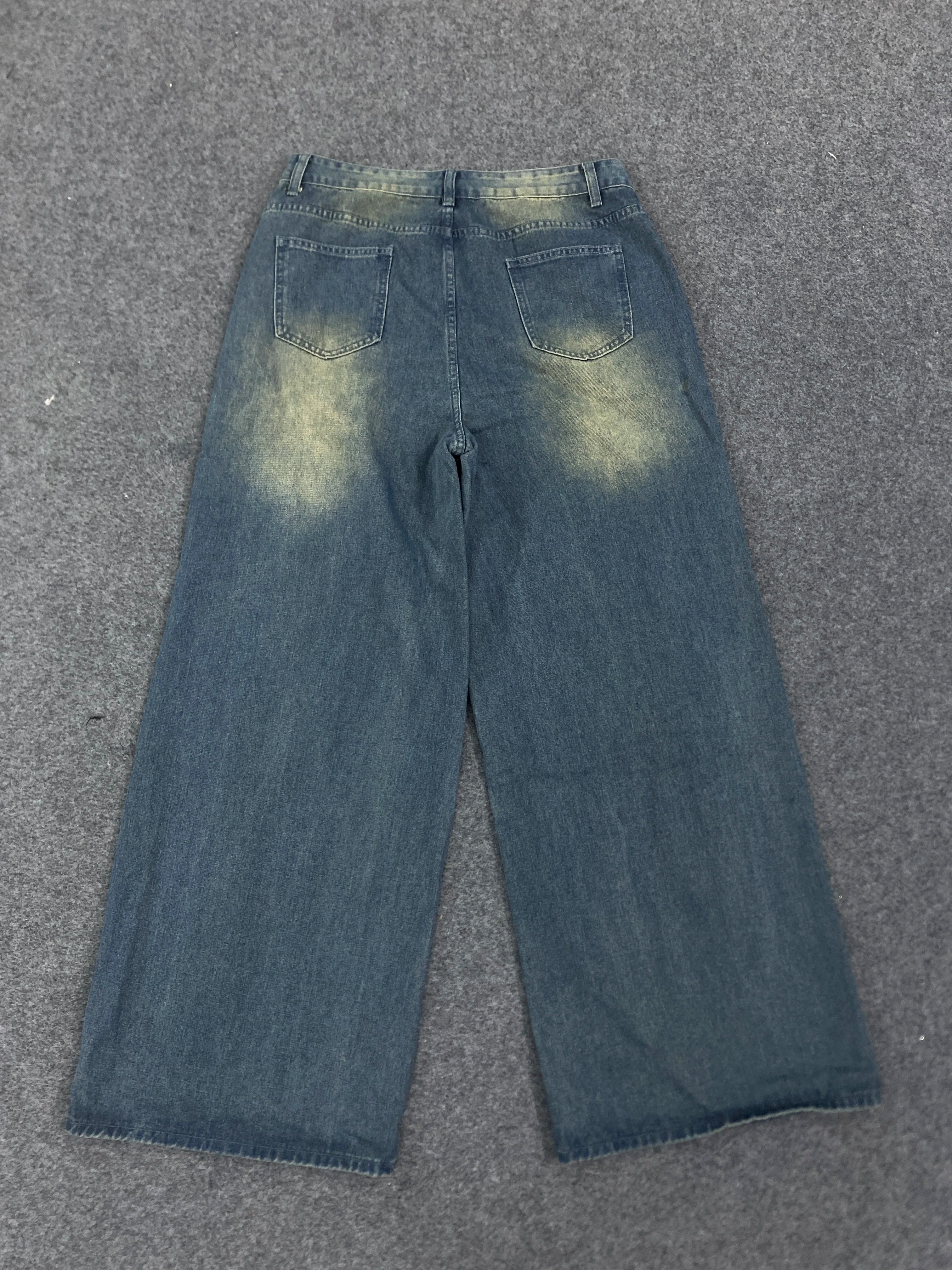 New denim pants for both men and women, specially designed for simple daily wear with holes and knees, rivet jeans